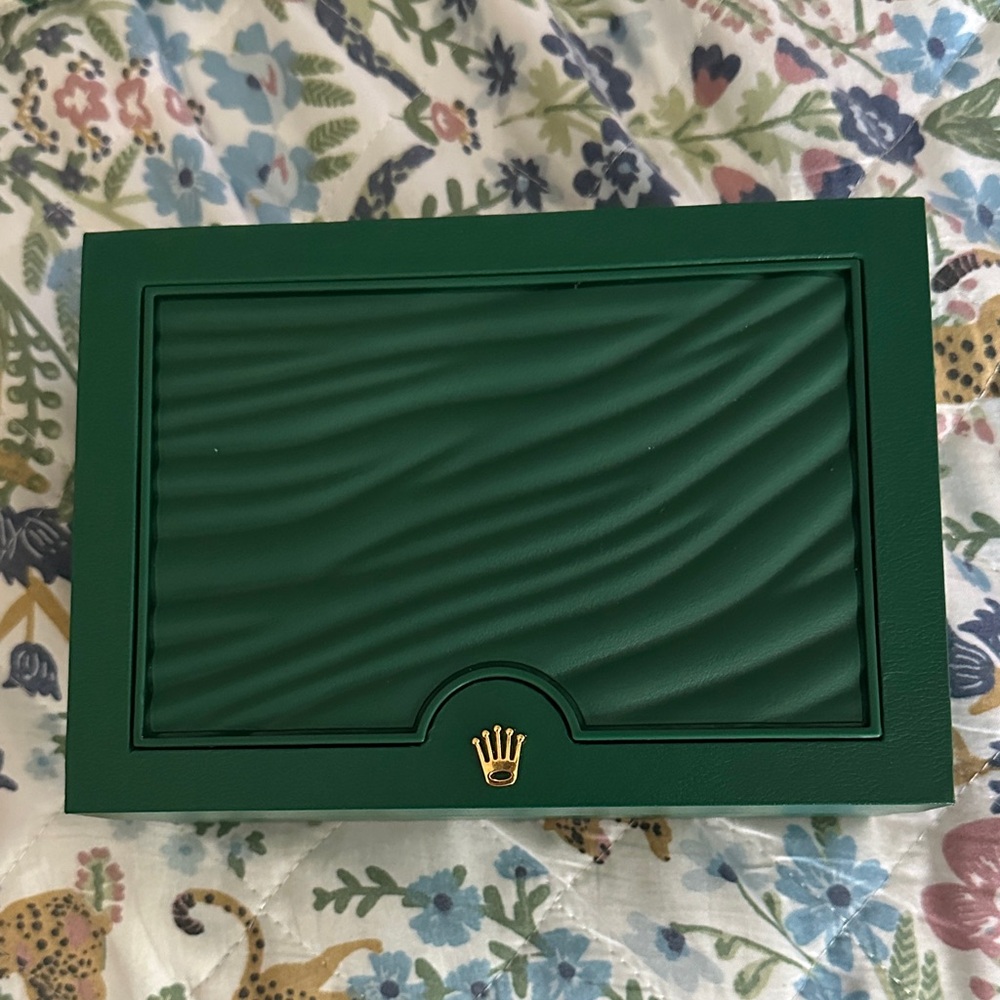 Elegant brand new Rolex box.